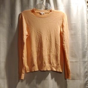Light orange sweater